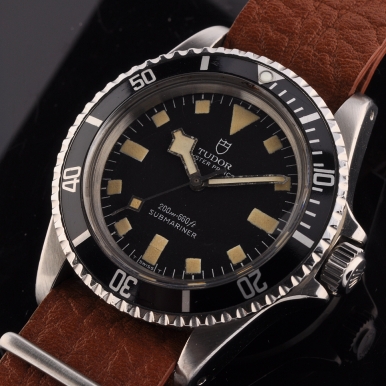 1968 Tudor Oyster Prince Submariner stainless steel watch with original rare case in good shape, military style dial, and matching hands.