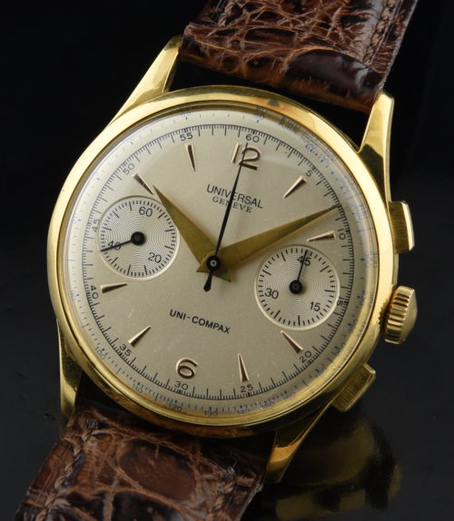 1940s Universal Geneve 18k yellow-gold two-register chronograph watch with original case, restored dial, and clean manual winding movement.