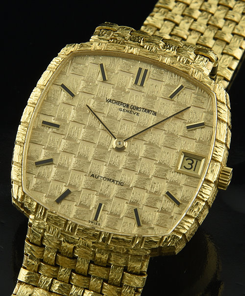 1970s Vacheron Constantin 18k solid-gold watch with original basket-weave bracelet/dial, handset, and caliber K1120 rhodium-plated movement.