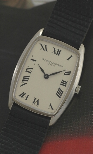 1970s Vacheron Constantin Geneve solid-white-gold watch with original case, ivory dial, Roman numerals, and caliber 1003 manual movement.