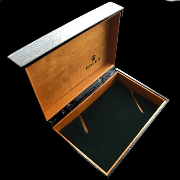 1960s vintage Rolex watch box with green velvet insert and measuring 4x5.5".