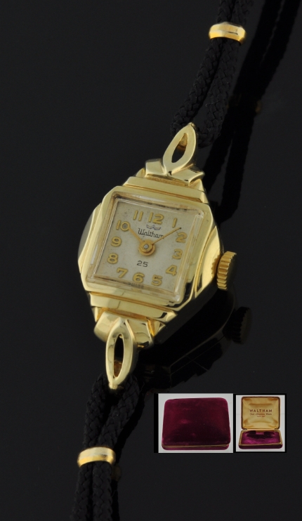 1950s Waltham 14k solid-gold ladies watch with original velvet box, stepped bezel, elongated lugs, and cleaned manual winding movement.