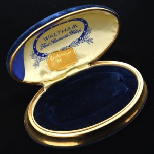 Waltham velvet watch box from the 1940s-1950s. This box measures 6" across with a brass base.