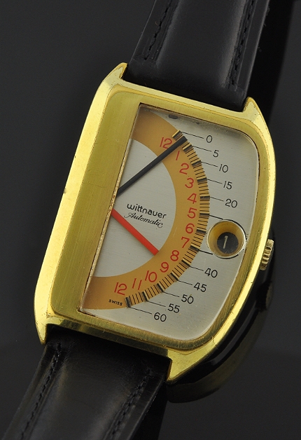 1975 Wittnauer Futurama Sector 1000 gold-plated watch with original case, retrograde dial, bubble-date crystal, and automatic movement.
