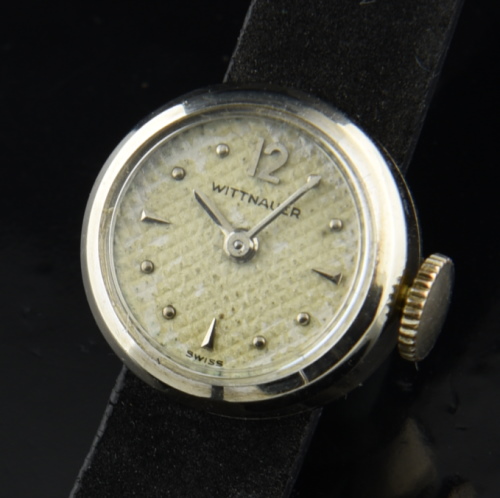1950s Wittnauer 15.5mm 14k white-gold-filled ladies cocktail watch with original honeycomb dial, arrow markers, and manual winding movement.