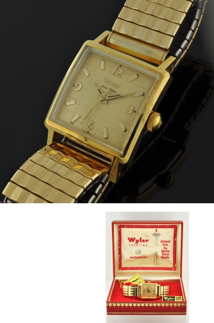 1960s new-old-stock Wyler stainless steel watch with original case-back fastening screws, stretch bracelet, and manual winding movement.