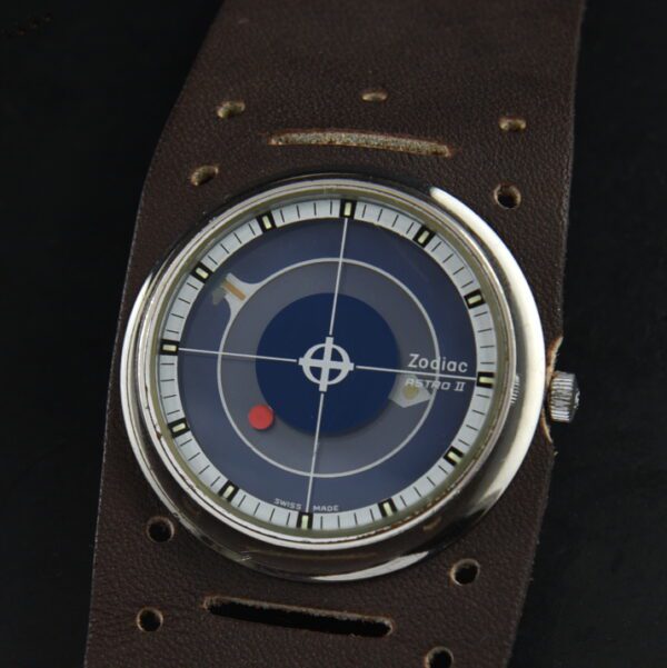 1975 Zodiac 38x45mm Astro 2 strainless steel watch with original chrome and steel case, mystery dial, leather band, and automatic movement.