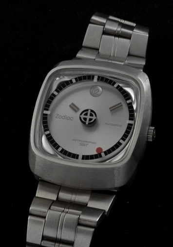 1970s Zodiac Astrographic SST stainless steel watch with original crystal, winding crown, floating hands, and unsigned generic bracelet.