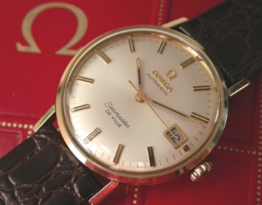 1960s Omega Seamaster De Ville gold-capped watch with original rare box, signed crown, crystal, and cleaned automatic winding movement.