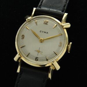 1950s Cyma 14k solid-gold watch with original smaller size, fancy lugs, case, diamond-pattern dial, and cleaned, accurate Swiss movement.