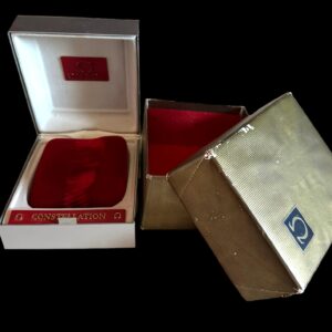 This is a hard-to-find vintage 1970s Omega Constellation metal watch box measuring 3.75x4.5" complete with original outer box.