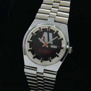 1970s Tissot PR515 stainless steel watch with original Monaco Sportombre dial, orange seconds, baton hands, and AS caliber 2066 movement.