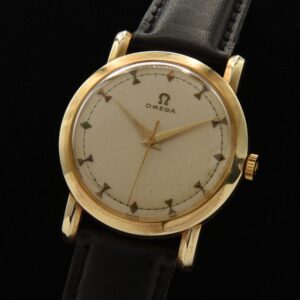 Uncommon vintage 1951 Omega manual wind with raised bowtie markers and Dauphine hands.