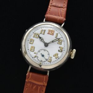 1914 vintage WW1 military watch having a fine porcelain original dial with cathedral hands. It is uncommon to find these with all original luminous intact on both the dial and hands.