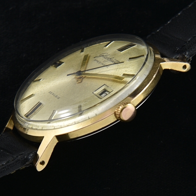 This 36mm Glashutte German watch is a simple and fine automatic watch you can wear daily. The case is gold plated with stainless steel back.
