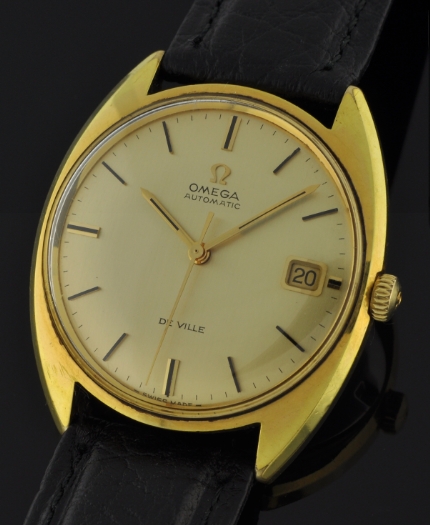 1966 Omega Seamaster De Ville gold-plated watch with original case, winding crown, hesalite crystal, and caliber 565 automatic movement.