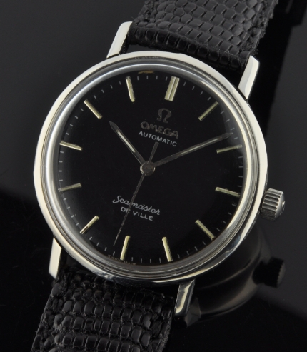 This is a classic 1960s Omega Seamaster De Ville in stainless steel, which has a sleek 34mm case and sea-monster back.