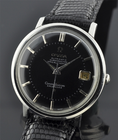 1964 Omega Constellation Calendar stainless steel watch with original restored black dial, Dauphine hands, case, and caliber 551 movement.