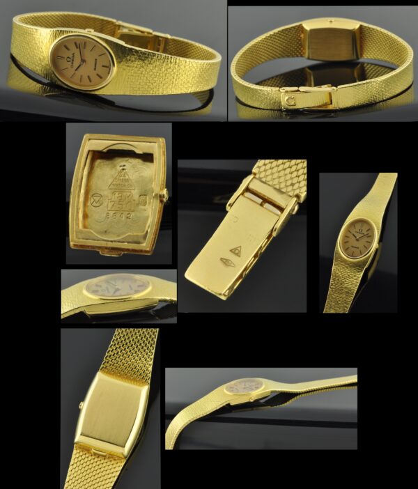 1980s Omega Quartz 18k solid-gold watch with original 7" bracelet, substantial amount of gold, and battery operated movement.