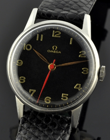 1947 Omega stainless steel watch with original restored black dial, feuille hands, gold-painted numerals, and clean manual winding movement.