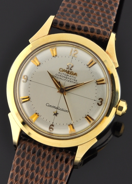 1954 Omega Constellation gold-capped watch with original winding crown, gold observatory logo, and caliber 501 chronometer-grade movement.
