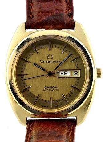 1970 Omega Constellation gold-filled watch with original signed crystal, dial, winding crown, day/date feature, and automatic movement.