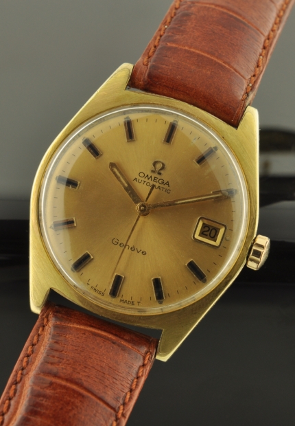 1968 Omega Geneve gold-plated watch with original screw-back case, dial, baton markers, and cleaned caliber 565 automatic winding movement.