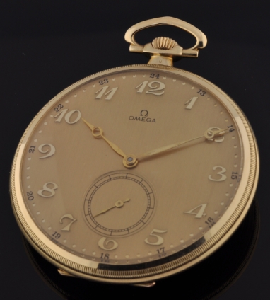 1930 Omega 14k solid-gold pocket watch with original Breguet numerals, restored dial, thin like-new case, and cleaned, accurate movement.