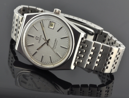 1978 Omega Seamaster stainless steel watch with original crystal, crown, bracelet, grey dial, markers, hands, and caliber 1010 movement.