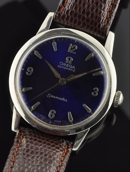 1958 Omega Seamaster stainless steel watch with original blue dial, Dauphine hands, winding crown, and clean, accurate caliber 470 movement.