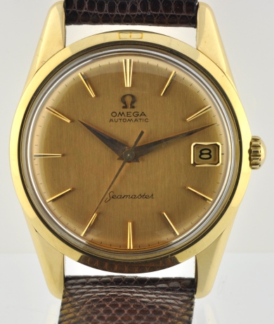 1960 Omega Seamaster 14k solid-gold watch with original sea-monster case, dial, Dauphine hands, sweep seconds, and caliber 562 movement.
