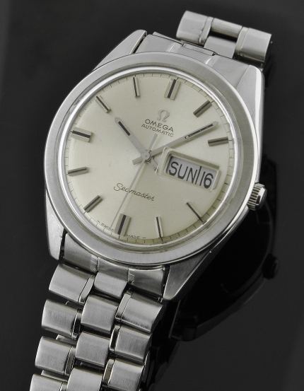 1969 Omega Seamaster stainless steel watch with original day/date aperture, silver dial, bracelet, bezel, and cleaned caliber 752 movement.