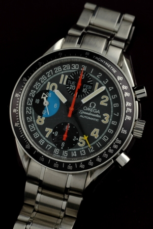 1990s Omega Speedmaster Professional stainless steel chronograph watch with original triple-date indicators, and clean automatic movement.
