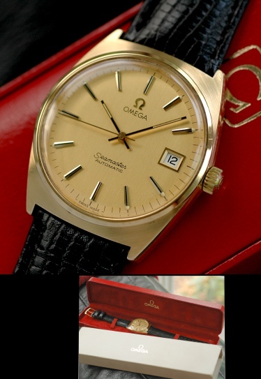 1970s Omega Seamaster Automatic gold-plated watch with original inner/outer boxes, signed case, winding crown, and caliber 1010 movement.
