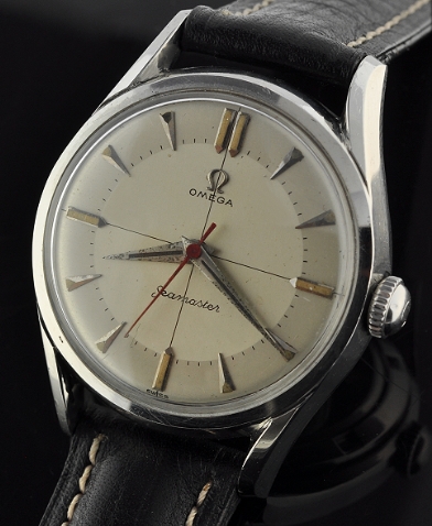 1952 Omega Seamaster stainless steel watch with original curved lugs, crosshair dial, Dauphine hands, and clean caliber 420 manual movement.