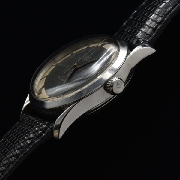 This 1955 vintage Tudor is one we named the "Tudor Tuxedo". We coined the name of this watch back over 15 years ago.