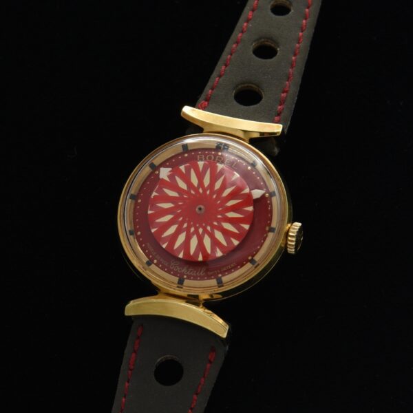 This 1960s manual winding Borel Cocktail watch was just serviced and is accurately ticking away; providing a mesmerizing kaleidoscope rotating inner section.