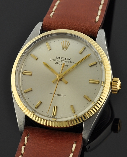 1967 Rolex Oyster Perpetual Air-King Precision stainless steel watch with original gold bezel, winding crown, case, and automatic movement.