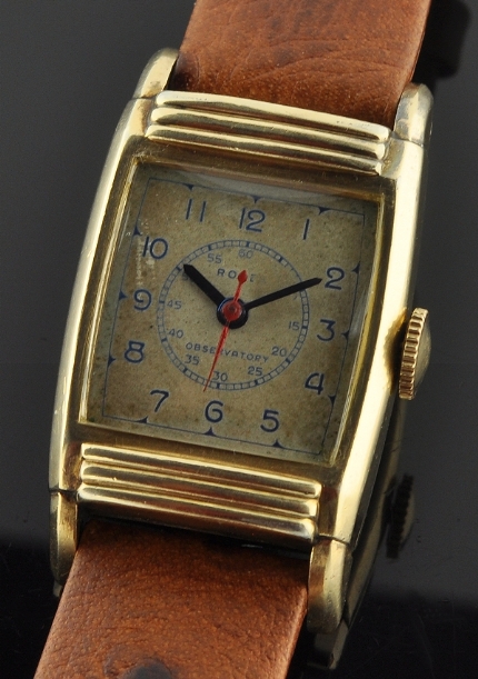 1940s Rolex Observatory watch with original small size, dial, gold reflective Arabic numerals, hands, case, and cleaned manual movement.