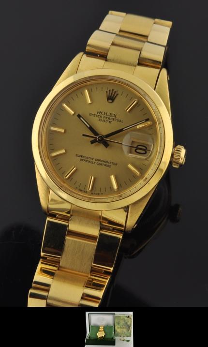 1986 Rolex Oyster Perpetual Date gold-plated watch with original case, heavy bracelet, dial, handset, hang tag, and caliber 3035 movement.
