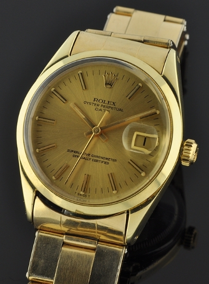 1973 Rolex Oyster Perpetual Date 14k gold-filled watch with original case, riveted bracelet, dial, handset, and automatic winding movement.