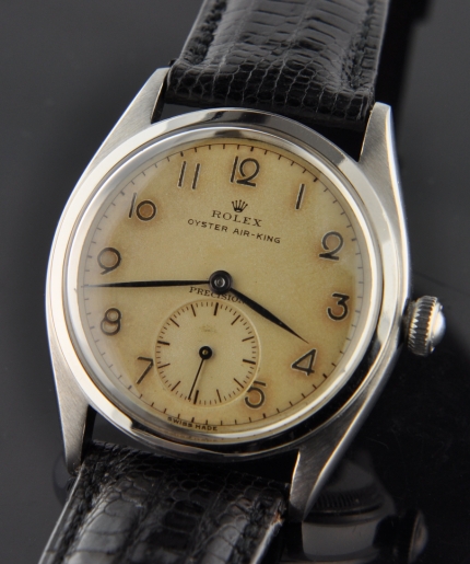 1946 Rolex Oyster Air-King Precision stainless steel watch with original case, rare dial, hands, numerals, and manual winding movement.
