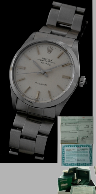 1986 Rolex Oyster Perpetual Air-King Precision stainless steel watch with original guarantee, repair receipt, and caliber 1520 movement.