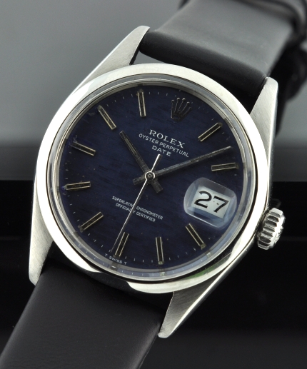 1971 Rolex Oyster Perpetual Date stainless steel watch with original exotic blue dial, baton markers, hands, and clean automatic movement.