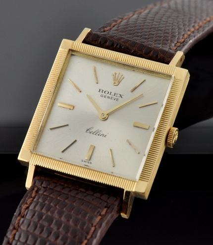 1965 Rolex Geneve Cellini 18k solid-gold watch with original small case, winding crown, silver dial, baton markers, and manual movement.