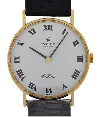 1980s Rolex Geneve Cellini 14k gold watch with original white dial, Roman numerals, case, crocodile band, and clean manual winding movement.