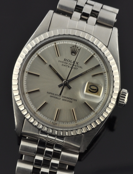 1970 Rolex Oyster Perpetual Datejust stainless steel watch with original scratchless case, Jubilee bracelet, and automatic winding movement.
