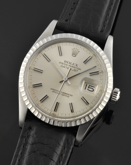1980 Rolex Oyster Perpetual Datejust stainless steel watch with original ridged bezel, silver dial, and cleaned automatic winding movement.