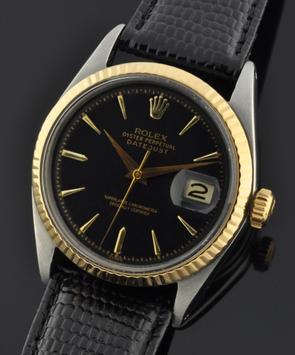 1961 Rolex Oyster Perpetual Datejust stainless steel watch with original refinished black dial, gold bezel, and clean caliber 1560 movement.