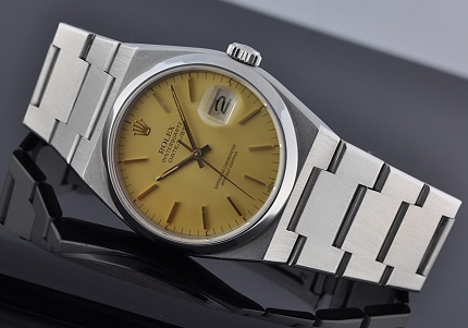 1981 Rolex Oysterquartz Datejust stainless steel watch with original case, gold dial, bezel, quickset date, and clean caliber 1530 movement.